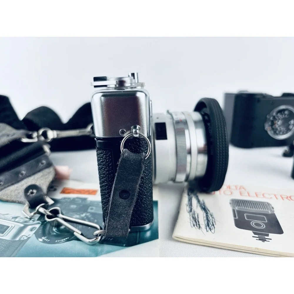 Yashica Vintage Electro 35 GSN Camera & Minolta Electroflash 28 & Film & Books